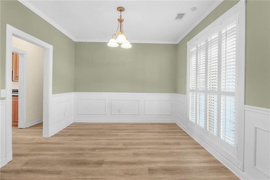 This three bedroom, two and one-half bath home with a marshview on Sapelo Hammock Golf Club in Georgia - for sale on GolfHomes.com, golf home, golf lot