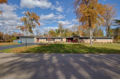 Architect Frank Lloyd Wright would be proud of this Mid-century on Battle Creek Country Club in Michigan - for sale on GolfHomes.com, golf home, golf lot