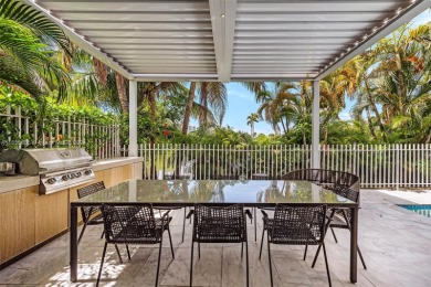 Located in an exclusive gated community, this stunning 5-bedroom on Turnberry Isle Resort and Club in Florida - for sale on GolfHomes.com, golf home, golf lot