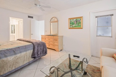 WELCOME TO THIS NATURALLY BRIGHT CONDO WITH SOUTH FACING BALCONY on  in Florida - for sale on GolfHomes.com, golf home, golf lot