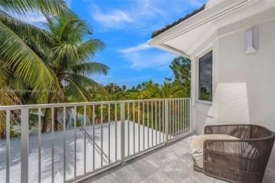 Located in an exclusive gated community, this stunning 5-bedroom on Turnberry Isle Resort and Club in Florida - for sale on GolfHomes.com, golf home, golf lot