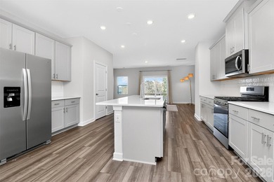 Welcome to your energy-efficient sanctuary, where modern design on Renaissance Park Golf Course in North Carolina - for sale on GolfHomes.com, golf home, golf lot