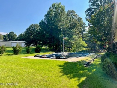 : Welcome to your very own slice of paradise! This stunning on Kirkwood National Golf Club in Mississippi - for sale on GolfHomes.com, golf home, golf lot