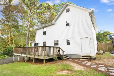 Welcome to this charming home nestled at the end of a quiet on Lake Forest Yacht and Country Club in Alabama - for sale on GolfHomes.com, golf home, golf lot