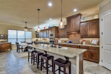 Welcome to this charming 4-bedroom, 2-bath home nestled within on Harbor Lakes Golf Club in Texas - for sale on GolfHomes.com, golf home, golf lot