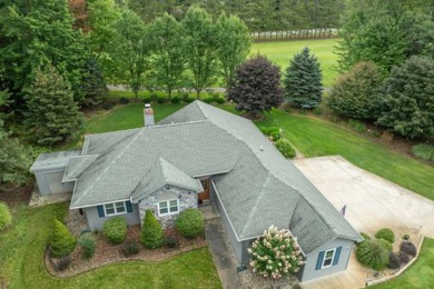 Golf front 3 bed/2 bath home on The Royal's #12 hole. This home on Canadian Lakes Country Club-The Royal Course in Michigan - for sale on GolfHomes.com, golf home, golf lot