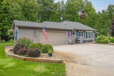 Golf front 3 bed/2 bath home on The Royal's #12 hole. This home on Canadian Lakes Country Club-The Royal Course in Michigan - for sale on GolfHomes.com, golf home, golf lot