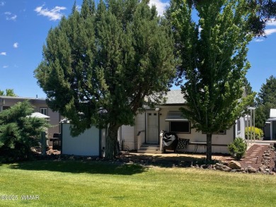 LOCATION is Everything at Juniper Ridge Resort! This spacious on Juniper Ridge R.V. Golf Resort in Arizona - for sale on GolfHomes.com, golf home, golf lot