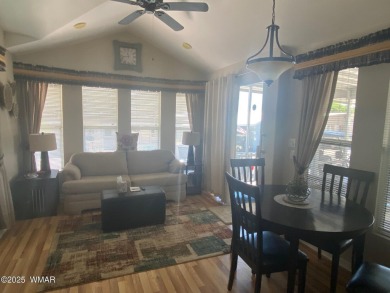 LOCATION is Everything at Juniper Ridge Resort! This spacious on Juniper Ridge R.V. Golf Resort in Arizona - for sale on GolfHomes.com, golf home, golf lot