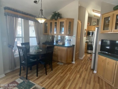 LOCATION is Everything at Juniper Ridge Resort! This spacious on Juniper Ridge R.V. Golf Resort in Arizona - for sale on GolfHomes.com, golf home, golf lot