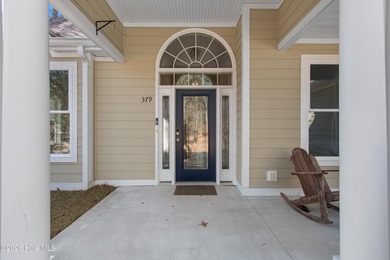 Meticulously maintained and thoughtfully designed for effortless on Lockwood Folly Country Club in North Carolina - for sale on GolfHomes.com, golf home, golf lot
