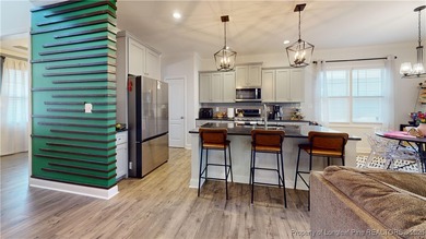 This move-in-ready home has it all! Floorplan with intentional on Gates Four Golf and Country Club in North Carolina - for sale on GolfHomes.com, golf home, golf lot