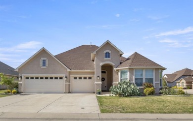Discover this stunning one-story Ashland model, perfectly on Wildhorse Golf Club of Robson Ranch in Texas - for sale on GolfHomes.com, golf home, golf lot