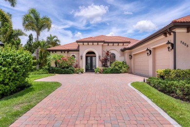 Welcome to your dream home--an elegant three-bedroom on Lakewood Ranch Golf and Country Club in Florida - for sale on GolfHomes.com, golf home, golf lot
