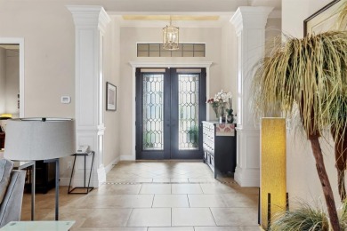 Welcome to your dream home--an elegant three-bedroom on Lakewood Ranch Golf and Country Club in Florida - for sale on GolfHomes.com, golf home, golf lot