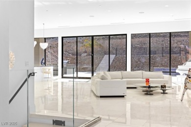 Welcome to 1455 Macdonald Ranch Dr--an exquisite desert oasis on Dragon Ridge Country Club in Nevada - for sale on GolfHomes.com, golf home, golf lot