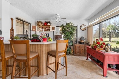 Spacious 2-bedroom, 2-bath home offering over 2,100 sq ft of on Caloosa Greens Executive Golf Course in Florida - for sale on GolfHomes.com, golf home, golf lot