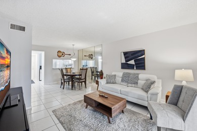 Beautifully maintained 2-bedroom, 2-bath corner unit in on Forest Oaks Golf Club in Florida - for sale on GolfHomes.com, golf home, golf lot