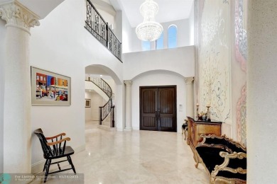 Located In The Heart Of Boca Raton, This Three-story Estate In on Polo Club of Boca Raton in Florida - for sale on GolfHomes.com, golf home, golf lot