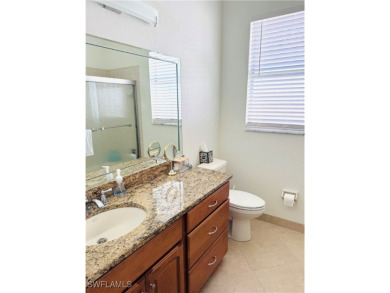 Welcome to this beautifully updated and meticulously maintained on Gateway Golf and Country Club in Florida - for sale on GolfHomes.com, golf home, golf lot