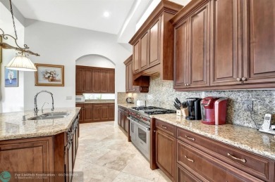 Located In The Heart Of Boca Raton, This Three-story Estate In on Polo Club of Boca Raton in Florida - for sale on GolfHomes.com, golf home, golf lot