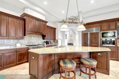 Located In The Heart Of Boca Raton, This Three-story Estate In on Polo Club of Boca Raton in Florida - for sale on GolfHomes.com, golf home, golf lot