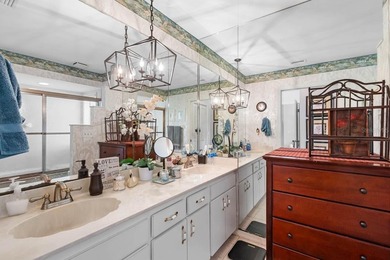 Spacious 2-bedroom, 2-bath home offering over 2,100 sq ft of on Caloosa Greens Executive Golf Course in Florida - for sale on GolfHomes.com, golf home, golf lot