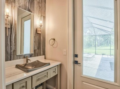 *Photos are of model homes. Actual home proposed construction on Golden Eagle Country Club in Florida - for sale on GolfHomes.com, golf home, golf lot