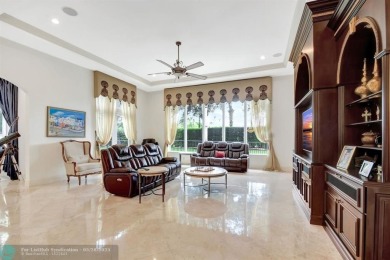 Located In The Heart Of Boca Raton, This Three-story Estate In on Polo Club of Boca Raton in Florida - for sale on GolfHomes.com, golf home, golf lot