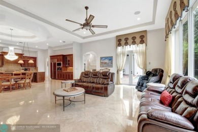 Located In The Heart Of Boca Raton, This Three-story Estate In on Polo Club of Boca Raton in Florida - for sale on GolfHomes.com, golf home, golf lot