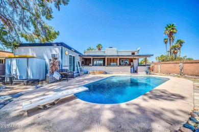 Picture warm summer nights lounging by your pool and a golf on Villa De Paz Golf Course in Arizona - for sale on GolfHomes.com, golf home, golf lot