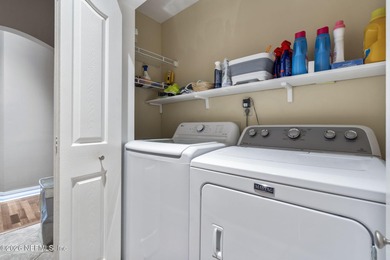 This renovated 4 bedroom 3 bath single-family home in the gated on Jacksonville Golf and Country Club in Florida - for sale on GolfHomes.com, golf home, golf lot