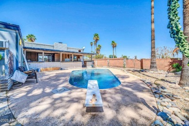 Picture warm summer nights lounging by your pool and a golf on Villa De Paz Golf Course in Arizona - for sale on GolfHomes.com, golf home, golf lot