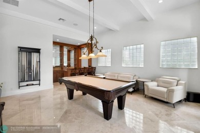 Located In The Heart Of Boca Raton, This Three-story Estate In on Polo Club of Boca Raton in Florida - for sale on GolfHomes.com, golf home, golf lot
