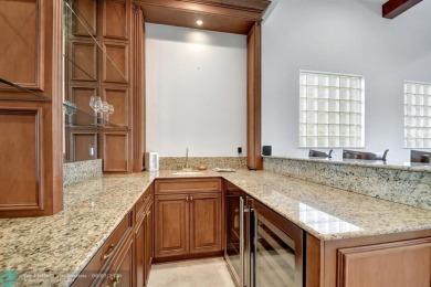 Located In The Heart Of Boca Raton, This Three-story Estate In on Polo Club of Boca Raton in Florida - for sale on GolfHomes.com, golf home, golf lot