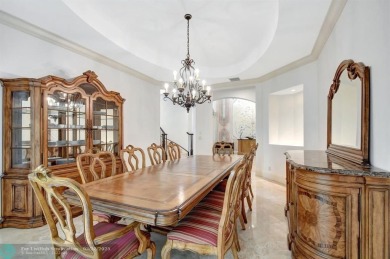 Located In The Heart Of Boca Raton, This Three-story Estate In on Polo Club of Boca Raton in Florida - for sale on GolfHomes.com, golf home, golf lot