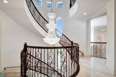 Located In The Heart Of Boca Raton, This Three-story Estate In on Polo Club of Boca Raton in Florida - for sale on GolfHomes.com, golf home, golf lot