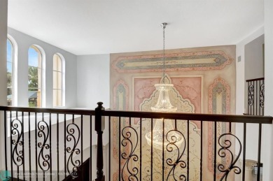 Located In The Heart Of Boca Raton, This Three-story Estate In on Polo Club of Boca Raton in Florida - for sale on GolfHomes.com, golf home, golf lot