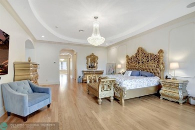 Located In The Heart Of Boca Raton, This Three-story Estate In on Polo Club of Boca Raton in Florida - for sale on GolfHomes.com, golf home, golf lot
