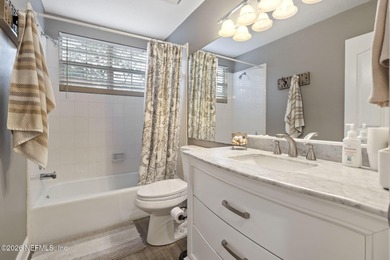 This renovated 4 bedroom 3 bath single-family home in the gated on Jacksonville Golf and Country Club in Florida - for sale on GolfHomes.com, golf home, golf lot