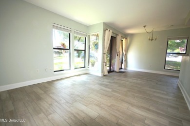 Welcome to your dream villa nestled in the vibrant heart of on Diamondhead Country Club in Mississippi - for sale on GolfHomes.com, golf home, golf lot