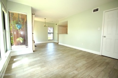 Welcome to your dream villa nestled in the vibrant heart of on Diamondhead Country Club in Mississippi - for sale on GolfHomes.com, golf home, golf lot