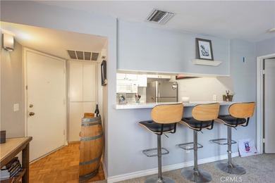 This charming one-bedroom corner unit in the gated Bixby Village on Bixby Village Golf Course in California - for sale on GolfHomes.com, golf home, golf lot