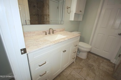 Welcome to your dream villa nestled in the vibrant heart of on Diamondhead Country Club in Mississippi - for sale on GolfHomes.com, golf home, golf lot