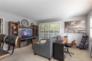 This charming one-bedroom corner unit in the gated Bixby Village on Bixby Village Golf Course in California - for sale on GolfHomes.com, golf home, golf lot