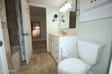 Welcome to your dream villa nestled in the vibrant heart of on Diamondhead Country Club in Mississippi - for sale on GolfHomes.com, golf home, golf lot