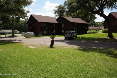 Welcome to your dream villa nestled in the vibrant heart of on Diamondhead Country Club in Mississippi - for sale on GolfHomes.com, golf home, golf lot