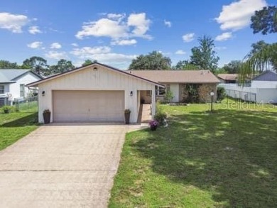 Lovely 3 bedroom 2 bathroom 2 car garage home with a split on Sherman Hills Golf Club in Florida - for sale on GolfHomes.com, golf home, golf lot