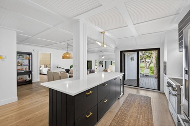 Stunning fully renovated single-family home in coveted on  in Florida - for sale on GolfHomes.com, golf home, golf lot