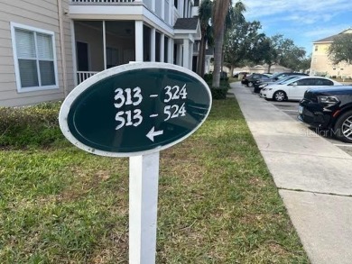 This ideal second floor condo has a sweeping view of the lake on Manatee County Golf Course in Florida - for sale on GolfHomes.com, golf home, golf lot